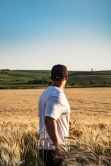 photo of a man in a wheat field